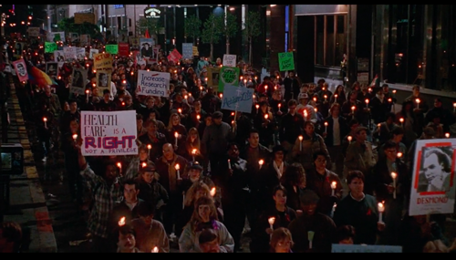 Irwin Winkler, The Net (still depicting Angela Bennett disappearing into an ACT UP protest, taking place outside a tech conference), 1995. This scene was shot at the 1995 MacWorld convention in San Francisco.