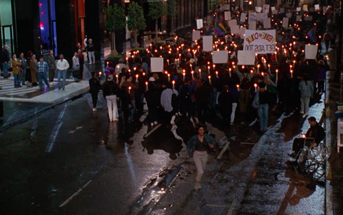 Irwin Winkler, The Net (still depicting Angela Bennett disappearing into an ACT UP protest, taking place outside a tech conference), 1995. This scene was shot at the 1995 MacWorld convention in San Francisco.