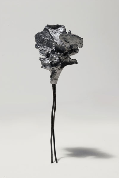 Adrian Göllner, An explosion 1/1,000,000,000th the power of the first atomic bomb, 2016, aluminum and steel, 5.5 x 2 x 1”. Image courtesy of the artist.