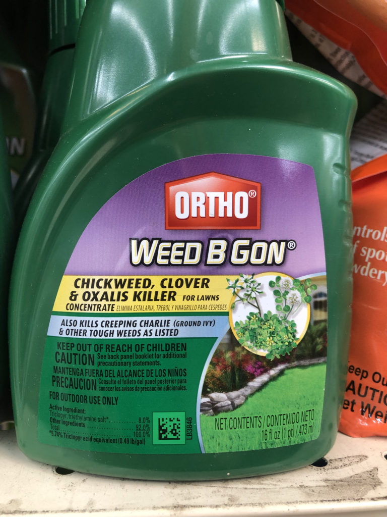 IMAGE 7: Herbicide for use on residential lawns, featuring illustrations of clover, chickweed (Stellaria media) and wood sorrel (Oxalis stricta), photographed at a hardware store in Placerville, California, June 2019.