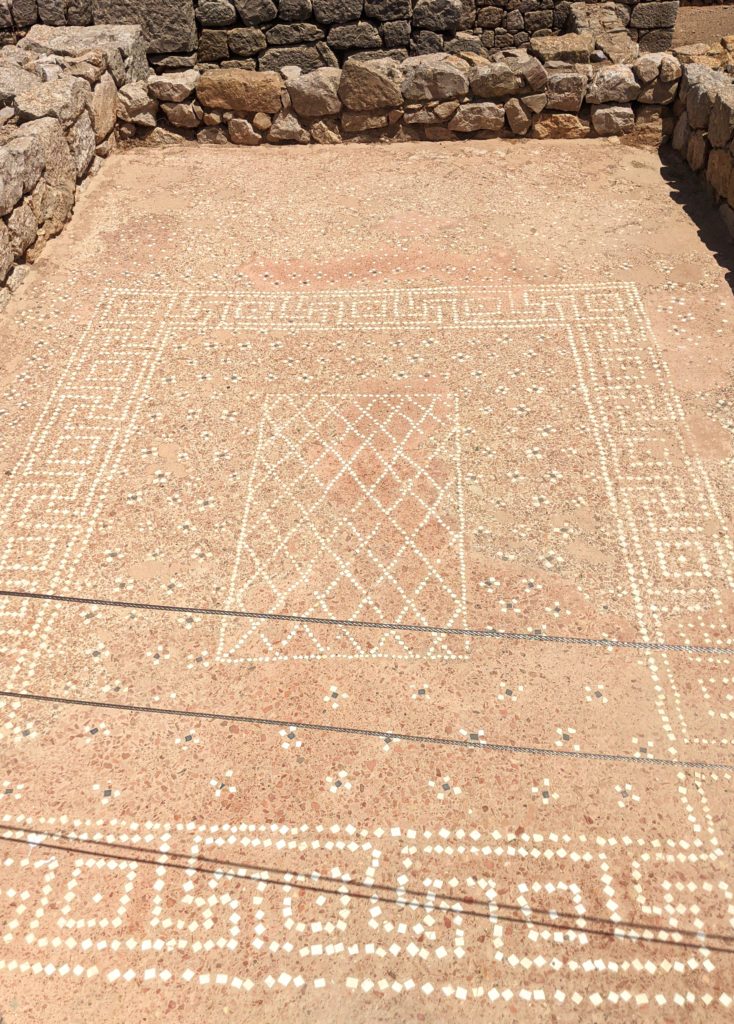 Photograph of a Roman mosaic tile floor at the ruins of Empúries. Image credit: Marissa Lee Benedict