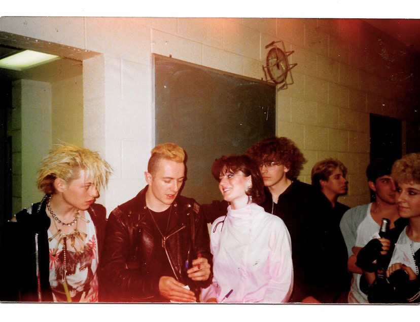 The Clash backstage with fans, St. Paul, MN, 1984. Photo courtesy of the artist.