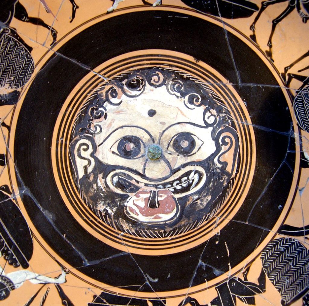 Gorgoneion. Tondo of an Attic black-figured cup, end of 6th century BCE. Wikicommons public domain: https://commons.wikimedia.org/wiki/File:Gorgoneion_Cdm_Paris_320.jpg